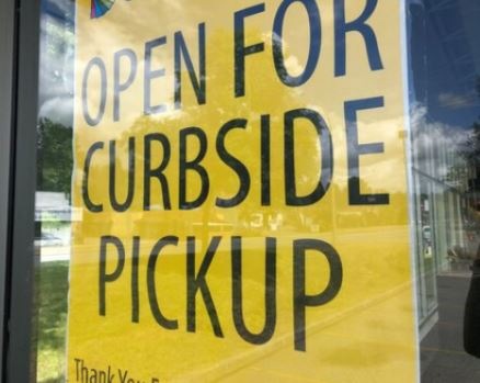 curbside pickup sign for text and sms
